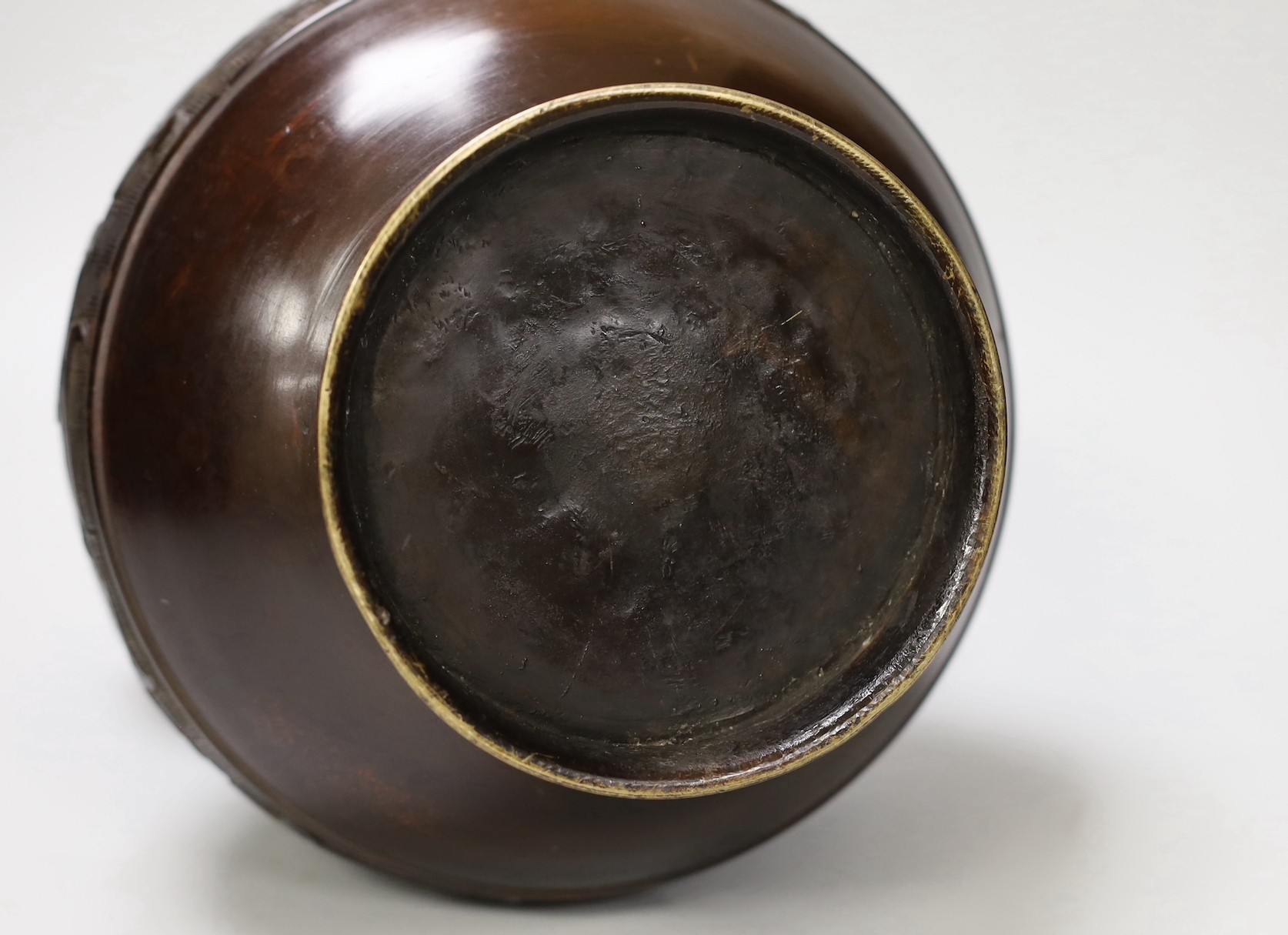 A Chinese archaistic bronze double handled 'hu' vase, 19th century, 27.5cm high